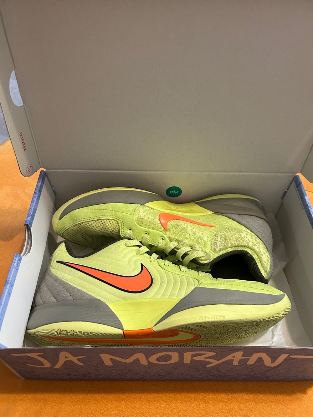 Nike Men’s Volt Athletic Shoes with Orange Swoosh